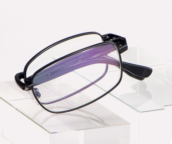 Folding spectacle frame